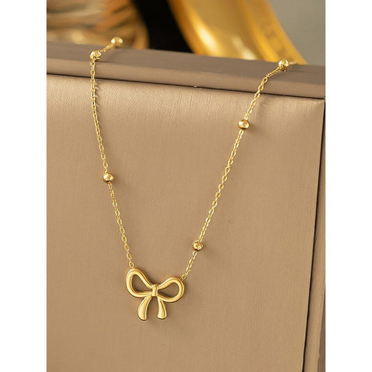 Bow Gold necklace